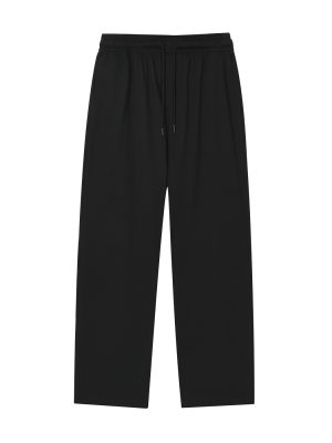Pantalón deportivo holgado en color negro.